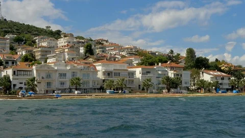 Close up view of the beautiful island resort town and azure sea Stock Footage 97635571