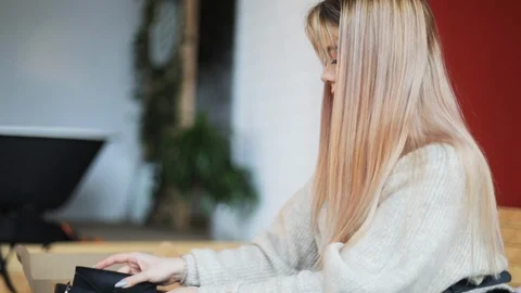 Close up view of beautiful long-haired blonde woman in stylish outfit checking Video stock 104562222