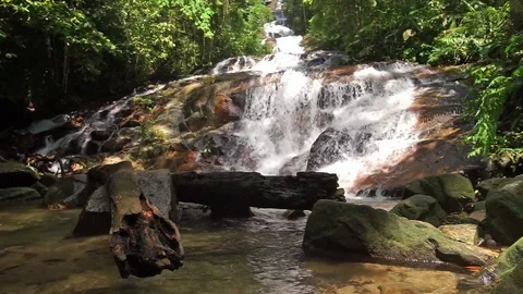 A close-up view of a beautiful streaming waterfall in Malaysia. Stock Footage 80184406