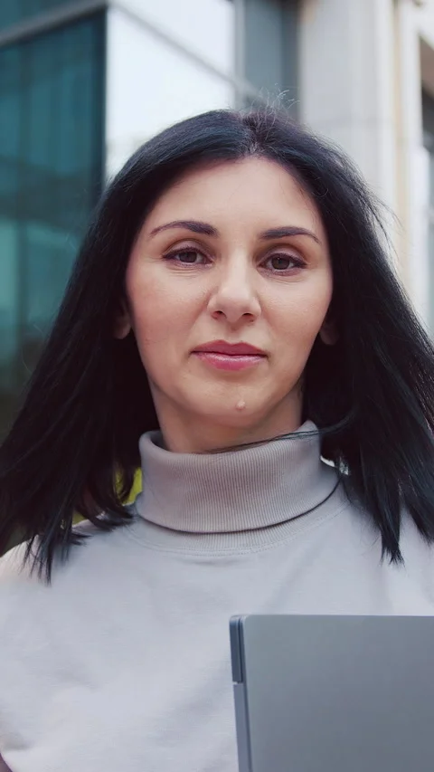 Close-up view of beautiful young Caucasian woman using smartphone online looking Stock Footage 331665824