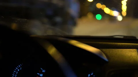 Close-up view from behind the wheel of a car, cars drive behind the windshield Stock Footage 146410886