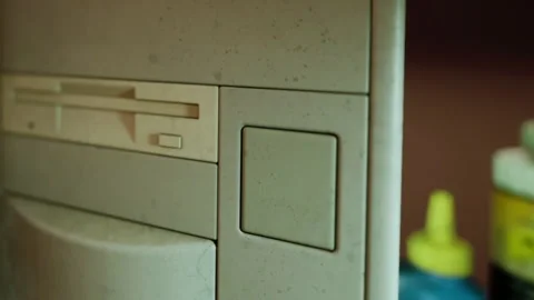Close up View of Beige Computer Tower With Dust on Case Stock Footage 348109921