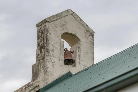 Close-up view of a bell mounted on the rooftop of Camberwell Church Foto stock