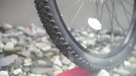 A close-up view of a bicycle wheel featuring a mounted tire, showcasing the intr Video stock 301582510