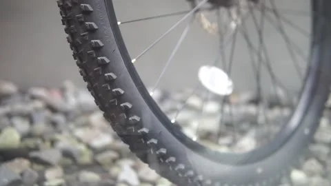 A close-up view of a bicycle wheel featuring a mounted tire, showcasing the intr Video stock 301582515