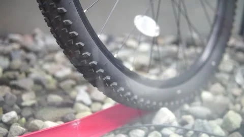 A close-up view of a bicycle wheel featuring a mounted tire, showcasing the intr Video stock 301582518