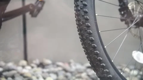 A close-up view of a bicycle wheel featuring a mounted tire, showcasing the intr Video stock 301582523