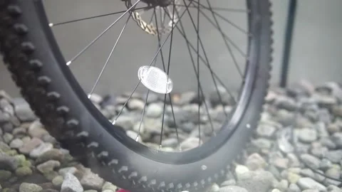 A close-up view of a bicycle wheel featuring a mounted tire, showcasing the intr Video stock 301582529