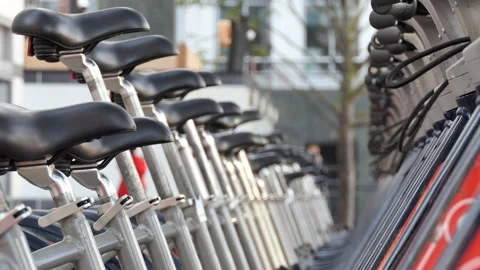 A close up view of the bicycles standing in a row. Stock Footage 96130387