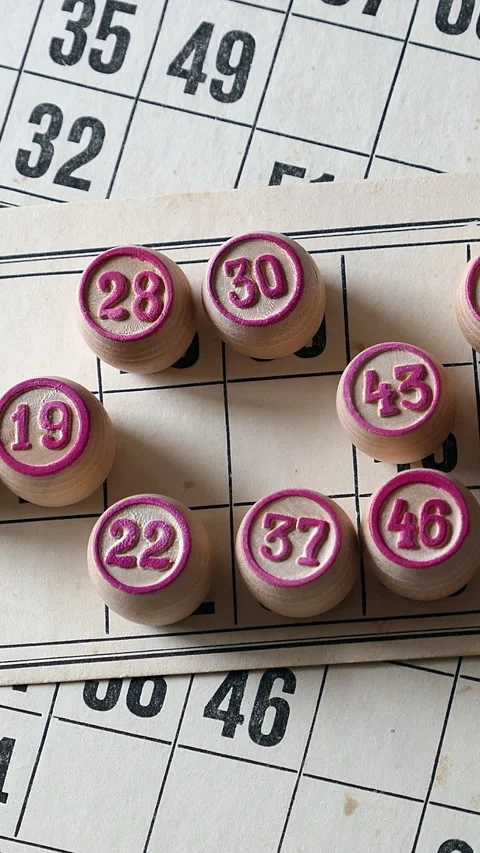 Close View Of Bingo Cards And Number Pieces. Bingo or Russian Loto. Slider Shot. Stock Footage 296685548