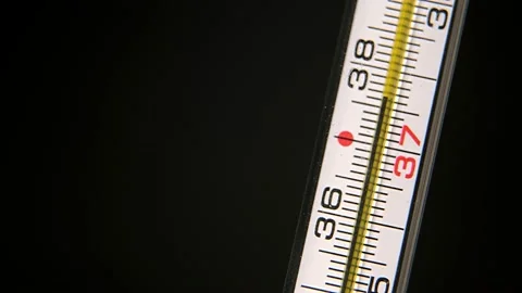 Close up view black and white video of glass thermometer with raising line of Stock Footage 172080027