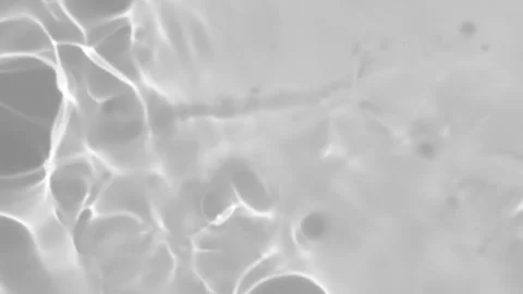 Close-up view of black and white rippling water surface with abstract 스톡 동영상 342617589