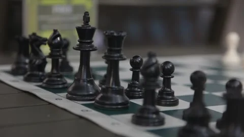 Close Up View of Black Chess Pieces on Board Outdoor Stock Footage 341323531