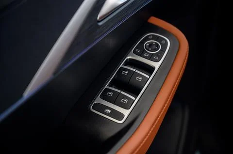 Close up view of black control panel on door of modern car. Foto stock