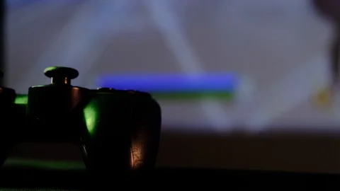 Close-up view black controller on table to play video games on game console. Stock Footage 130055531