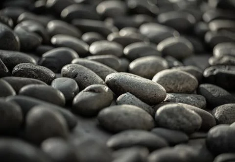 Close-up view of Black pebbles. Stock Photos