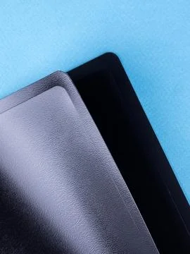 Close-up view of black  plastic document folder on office table Stock Photos