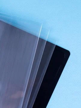 Close-up view of black  plastic document folder on office table Stock Photos