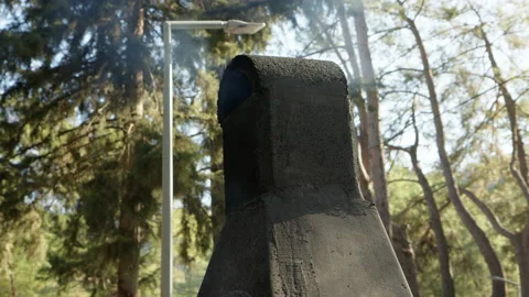 Close view of black stone chimney of furnace covered in soot from which acrid Stock Footage 230726210