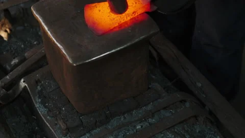 Close-up view of Blacksmith forges red-hot metal. Stock Footage 209631740