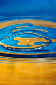 Close-up view on blue and yellow aquarelle paint like Ukrainian flag Stock Photos