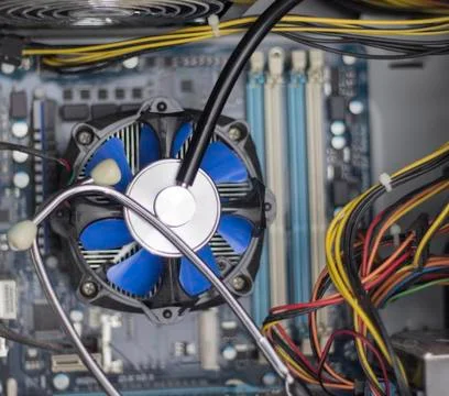 Close-up view of blue cpu fan and stethoscope. Stock Photos