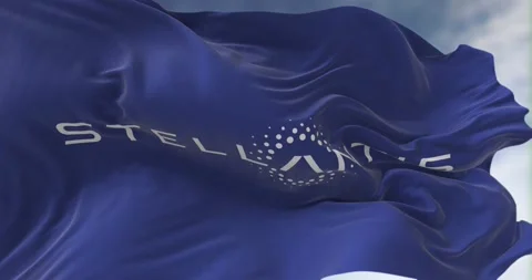 Close-up view of the blue flag with the Stellantis logo waving in the wind. Video stock 171827656