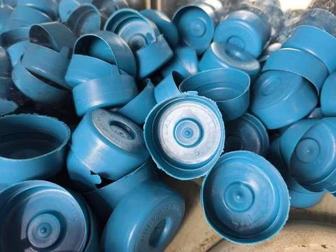 Close-up View of Blue Plastic Caps Ready for Recycling or Reuse Stock Photos