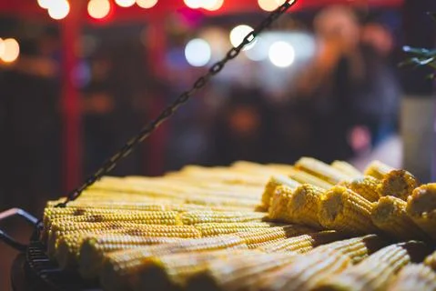 Close up view of boiled corn laid out on grill with blurred background Stock Photos