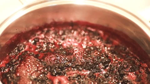 Close-up view of boiling blueberries. Stock Footage 112062188