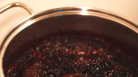 Close-up view of boiling blueberries. Stock Footage 112062192
