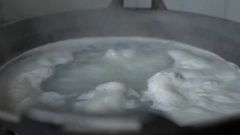 Close-up view of boiling palm sugar foam Stock Footage 261931069