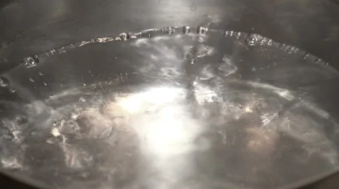 Close-up View of Boiling Water in a Kitchen Pot. Full HD Video stock 45951683