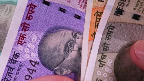 Close up view of brand new indian rupees banknotes. Money background. Stock Footage 288906299