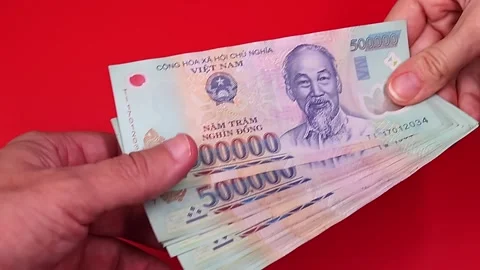 Close up view of brand new vietnamese 500000 dong banknotes. Stock Footage 289753720