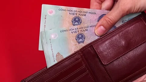 Close up view of brand new vietnamese 500000 dong banknotes. Stock Footage 289754002