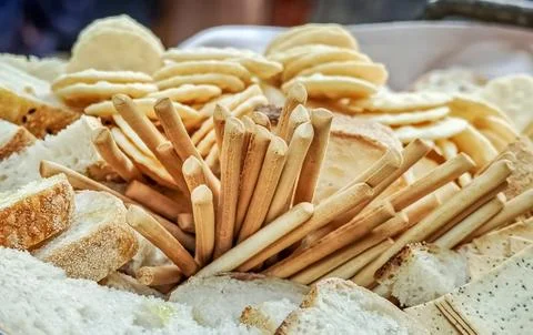Close-up view of Bread Sticks placed among other Crackers and Bread items Stock Photos
