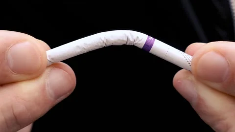 Close-up view of breaking cigarette Stock Footage 310727957