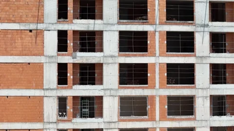Close-Up View of Brick and Concrete Apartment Building Under Construction Stock Footage 311639584