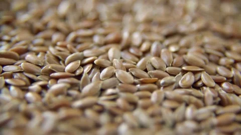 Close up view of brown flax seeds Stock Footage 333873859