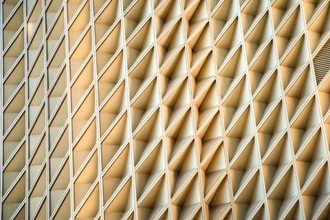 A close up view of a building wall with white squares Foto stock