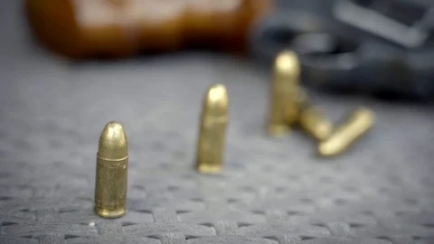 Close up view of bullets and handgun Stock Footage 95888912