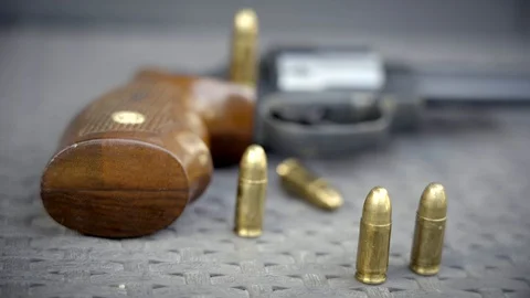 Close up view of bullets and handgun Stock Footage 95888995