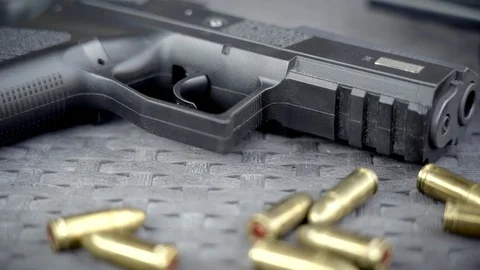 Close up view of bullets and handgun Stock Footage 95889252