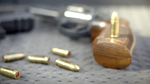Close up view of bullets and handgun Stock Footage 95889409