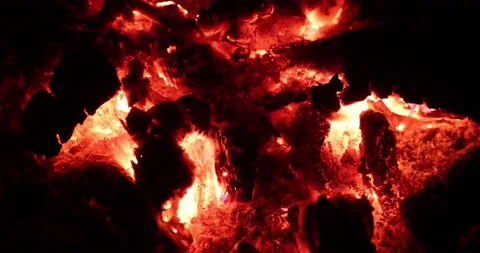 Close-up view of burning embers from a campfire. Stock Footage 157739360