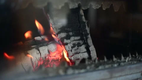 Close up view of burning fire in old cast-iron stove of retro style interior Stock Footage 151951334