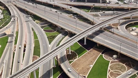 Close up view of a busy highway intersection in Dubai, UAE at daytime. Stock Footage 82383014