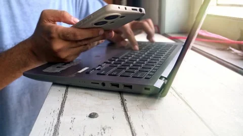 A close up view of a busy person multitasking by using a modern smartphone .. Video stock 345139818