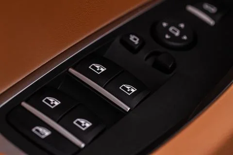 Close up view of button controlling window in modern car interior. Vehicle in 스톡 사진